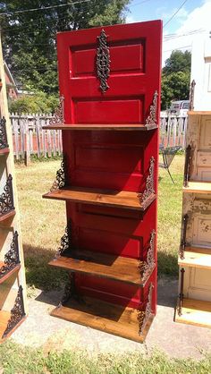 an old red door is turned into a shelf