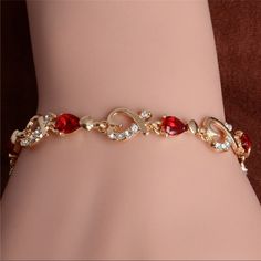 It Is A Very Good Bracelet Brand New And Plated In Gold With Ruby Hearts Bracelets Fashion, Red Accessories, Crystal Fashion, Hand Bracelet, Red Bracelets, Heart Chain, Red Jewelry, Ruby Jewelry, Gold Plated Bracelets