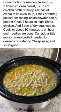 a crock pot filled with chicken noodle soup on top of a kitchen counter