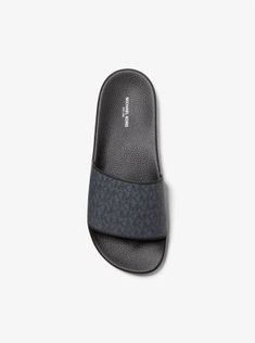 Our Jake slides are a stylish choice for both beach getaways and city breaks—the contoured footbeds ensure they’re comfortable to walk in when taking in the sights. Featuring our signature logo print these sandals will work just as well with a pair of swim shorts by the water as with denim jeans around town. Logo Slip-on Sandals For Summer, Flat Sandals With Logo For Summer, Modern Sandals With Logo For Summer, Summer Slip-on Sandals With Logo, Summer Beach Slides With Logo, Summer Flat Sandals With Logo, Modern Logo Sandals For Summer, Logo Open Toe Slides For Beach, Summer Slide Sandals With Logo