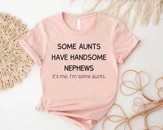 Auntie Shirt, Some Aunts Have Handsome Nephews Shirt, Aunt Gift From Nephew, Aunt Birthday Gift, Aunt Life Shirt, Aunt Sayings Shirt Gift 🎈HOW TO ORDER 1-) Please, check and review all the photos. 2-) Choose your t-shirt size and color. *Different styles of shirts may have different shades of same color choice due to different manufacturer brands. *For this reason, we recommend you to match shirts from the same styles if you want precisely matching colors (ex. Unisex, V-necks, Toddler, etc.). 3 Funny Aunt Onesie, Auntie Things, Nephew Shirts, Aunt Onesie, Auntie Quotes, Auntie Era, Auntie Baby, Godmother Shirts, Aunt Birthday Gift