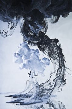 black and white ink floating in water