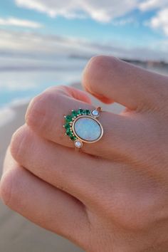 A classic opal with the most beautiful emerald green headdress - she's the perfect right hand ring for a special occasion!💚 Unique Oval Opal Birthstone Ring, Turquoise Oval Multi-stone Opal Ring, Unique Oval Multi-stone Emerald Ring, Unique Multi-stone Oval Opal Ring, Art Deco Rings, Deco Rings, Hand Rings, Right Hand Ring, Bright Turquoise