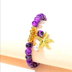 Purple & Gold Starfish Charm And Beaded Bracelet Nwt Purple Round Beads Bracelet For Beach, Purple Beaded Bracelets For The Beach, Purple Beaded Bracelets For Beach, Handmade Purple Stretch Bracelet For Beach, Purple Bracelet Jewelry For The Beach, Purple Bracelet Jewelry For Beach, Beach Jewelry With Colorful Purple Beads, Purple Jewelry With Colorful Beads For Beach, Bracelets Beaded