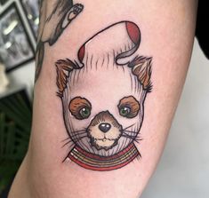 an animal tattoo on the leg of a person