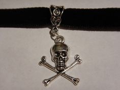 Silver Jolly Roger Skull Pendant on Velvet Choker Gothic Pirate 1K Alternative Adjustable Choker For Gift, Alternative Style Adjustable Choker As A Gift, Adjustable Alternative Style Choker For Gift, Adjustable Alternative Style Choker Gift, Adjustable Silver Punk Choker, Silver Adjustable Punk Choker, Halloween Alternative Style Adjustable Choker, Adjustable Silver Choker For Halloween, Adjustable Silver Halloween Choker