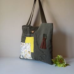 Chic Upcycled Patchwork Handmade Denim Tote Bag with Pockets, Spacious Travel Weekender Shoulder Bag Women & Girls, Everyday Use College Bag introducing our **unique upcycled denim tote bag a one-of-a-kind accessory that combines style and sustainability. This thoughtfully crafted bag is made from a new pair of thick denim, showcasing a vibrant mix of yellow and olive green fabrics. The addition of natural leather details enhances its chic aesthetic, making it a perfect statement piece for any o Casual Canvas Bags With Upcycled Details, Green Casual Upcycled Bags, Casual Green Upcycled Bags, Green Upcycled Shoulder Bag For Everyday, Everyday Green Upcycled Shoulder Bag, Tote Bag With Pockets, Crafted Bag, Bridesmaid Tote Bags, Flower Tote