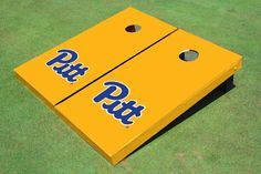 a yellow cornhole game with the pitt logo on it