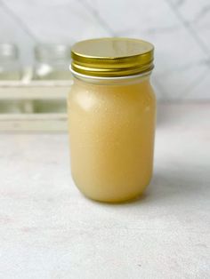 a yellow jar sitting on top of a counter