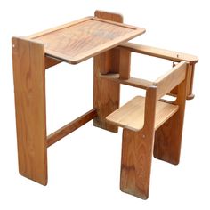 a small wooden table with two benches on it's sides and one bench at the top