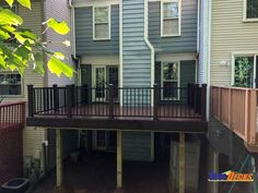 a house with a deck in front of it