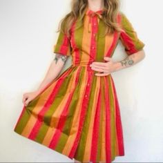 True Vintage Retro Rainbow Dress 60s-70s Fit & Flare Collared Orange Pink Green Stripe Size: 7/8 Vintage, Please See Measurements. Listing As Xxs. Bust 17” Flat (34” Around), Waist 11 3/4” Flat (23.5” Around), Approximately 37” Long. Condition: Guc/ Missing Original Belt. In Very Good Condition For Age. Details: Collared Dress With Bow At Neck, Buttons All The Way Down, Short Sleeve, Striped, Green, Brownish Orange, And Pink. Bow At Neck Is Removable, Midi/Knee Length, Short Sleeve. Both The Rn Number And The Pinking Sheer Cuts To The Seams Lead Me To Believe This Dress Is Well Over 60 Years Old! Please Excuse My Awkward Hand - This Dress Is Way Too Tiny For My Tummy! Collared Dress, Rainbow Dress, Retro Rainbow, 60s Dress, Orange And Pink, Collar Dress, Dress With Bow, Pink Bow, Green Stripes