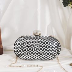 Beautiful Evening/Daytime Clutch for any event as the mirror work and black and white tones can be used throughout any season with any outfits! The bag is beautiful with mirror work and comes in two colors to complete the look! Elegant Sequin Shoulder Bag For Night Out, Glamorous White Party Bags, Elegant White Sequined Bags, Chic Formal Sequin Shoulder Bag, Party Black Clutch With Sequins, Luxury Party Bags With Mirror Work, Formal Evening Bag With Mirror Work, Elegant Black Sequined Evening Bag, Mirror Work Shoulder Bag For Party