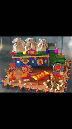 an elaborately decorated cake with candy and candies in the shape of a train