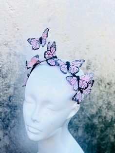 "Baby pink shade Monarch butterfly headpiece KIDS & ADULTS From our Whimsical Collection, this elegant monarch butterfly headband suitable to fit kids and adults features monarch butterflies on a headband I N C L U D E D Headband base topped with high quality intricately detailed butterflies. 3 or 7 Butterflies spread across the headband. 3 butterfly option is great for kids. The butterflies are 3.5\" in size. Headband fits kids age 7+ & adults. For toddlers and younger children, we will Pink Crown-shaped Headband For Party, Pink Crown Headband For Party, Summer Costume Party Headband, Carnival Adjustable Headpiece With Matching Headband, Adjustable Pink Headpiece For Costume Party, Adjustable Headband For Summer Costume Party, Adjustable Pink Costume Hat For Halloween, Adjustable Pink Halloween Costume Hats And Headpieces, Adjustable Pink Halloween Costume Hat