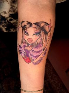 a woman's leg with a tattoo on it