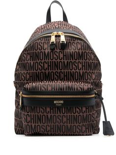 chestnut brown cotton blend calf leather trim gold-tone hardware front zip-fastening pouch pocket single flat top handle two padded adjustable shoulder straps top zip fastening main compartment Moschino Backpack, Moschino Bags, Monogram Backpack, Golden Logo, Moschino Logo, Pad Bag, Shoulder Strap Bag, Monogram Prints, Pink Backpack