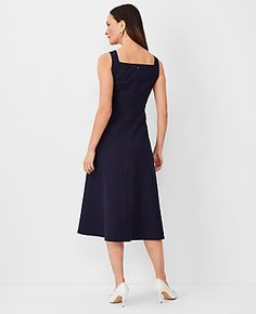 Elevate your wardrobe with the timeless elegance of Ann Taylor's Square Neck Midi Dress in the captivating Night Sky shade. This dress is meticulously designed to flatter your silhouette, featuring a classic A-line shape enhanced by artful pleating at the skirt.

- **Size:** Regular - 4
- **Color:** Night Sky
- **Material:** 78% Cotton, 20% Rayon, 2% Spandex
- **Gender:** Female
- **Length:** 32" from natural waist
- **Features:** Sleeveless, square neckline, front knife pleats, hidden back zipp Square Neck Pleated Midi Dress, Pleated Midi Dress With Square Neck, Fit And Flare Midi Dress With Box Pleat, Square Neck Midi Dress, Ann Taylor Petite, Knife Pleats, Dress Night, Knitted Suit, 40 Dress