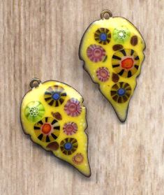 "Handmade Enamel Charms Yellow Flower Copper Leaf Lavender Charm Artisan Earring Component Enamel Leaves pair Jewelry making links by annabeads72 Pair of Enamel Charms, handmade by me in my home studio in Pittsburgh PA, one of a kind enamel on copper, colorful jewelry making supply, great start for artisan earrings, rustic enamel on reverse side Enamel charms size : 1.25\" by 0.75\" Quantity: 2 Wonderful pair! nothing wrong just did not went as I have planned color wise marked seconds" Yellow Enamel Pendant Jewelry, Multicolor Leaf-shaped Jewelry Gift, Multicolor Leaf Shaped Jewelry For Gifts, Unique Yellow Teardrop Jewelry, Handmade Multicolor Leaf-shaped Jewelry, Handmade Enamel Flower Jewelry, Yellow Enamel Flower Shaped Jewelry, Yellow Flower-shaped Enamel Jewelry, Unique Hand Painted Yellow Jewelry