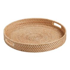 an oval rattan tray with handles