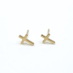 These pretty cross studs are available in 14k yellow or white gold. Our delicate take on this meaningful symbol will quickly become your everyday go-to earrings. available as a single stud or pair stud earring with butterfly backing all material is 14k gold approx. 3/8" tall by 1/4" wide  weight is .86 grams per pair including post & backing Pretty Cross, Cross Stud Earrings, Cross Earrings Studs, Summer Ideas, Gold Cross, Pendant Bracelet, Christmas Wishlist, Sterling Silver Studs, Sterling Silver Earrings Studs