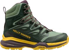 a green and yellow hiking boot with the words helly hansen written on it