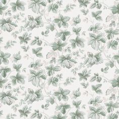 a green and white wallpaper with leaves on it