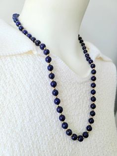 "Cheer up with this genuine blue lapis with gold tone spacer beads. Lapis stones have gold lines and are approx. 8mm. round Clasp: filigree fishhook Length approx. 25\" Condition: Good vintage" Elegant Lapis Lazuli Beaded Necklace, Luxury Gold Lapis Lazuli Beaded Necklace, Blue Lapis Lazuli Necklace With Large Beads, Bohemian Lapis Lazuli Hand-strung Necklace, Blue Faceted Lapis Lazuli Beaded Necklace, Lapis Necklace, Gold Line, Blue Lapis, Cheer Up