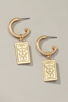 Rectangle drop earrings with etched heart. Made or iron and alloy. Shiny gold plating. Size: 0.5" x 1.25" Christmas Coat, Inner Wisdom, Denim Gift, Western Boho, Halloween Jewelry, Stunning Earrings, Unique Earrings, Heart Earrings, Gold Plating