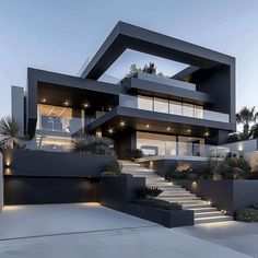 a modern house with stairs leading up to it