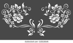 two white floral designs on a black background