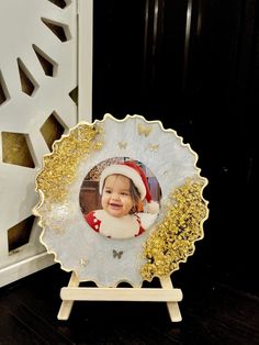 a white and gold plate with a photo on it