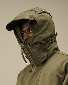 Hooded jacket crafted in Micro Kei, a soft-textured and durable nylon/polyester microfibre. Detachable down lining. Garment dyed anti-drop treated. Khaki Nylon Parka With Detachable Hood, Khaki Nylon Outerwear With Drawstring Hood, Nylon Hooded Jacket With Detachable Hood For Cold Weather, Utility Nylon Hooded Jacket With Double-lined Hood, Long Sleeve Nylon Outerwear With Storm Flap, Winter Nylon Utility Jacket With Drawstring Hood, Nylon Utility Jacket With Drawstring Hood For Winter, Utility Nylon Parka With Double-lined Hood, Functional Hooded Outerwear With Adjustable Hood