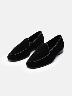 The Belgian - Black Suede is our sleek and sophisticated take on an iconic loafer that we like to pair with either a pair of denims, tailored trousers or black tie. This head-turning style with a French binding apron will undoubtedly elevate any outfit, whether that might be at home or on the town. Crafted in soft suede with a cushioning footbed for supreme comfort. Fitted Luxury Loafers For Formal Occasions, Luxury Fitted Loafers For Formal Occasions, Luxury Fitted Loafers For Semi-formal Occasions, Designer Fitted Loafers For Semi-formal Occasions, Designer Semi-formal Loafers, Luxury Fitted Loafers For Business Casual, Designer Goodyear Welted Loafers For Workwear, Classic Fitted Loafers For Semi-formal Occasions, Elegant Fitted Loafers For Semi-formal Occasions