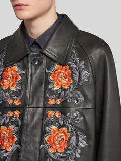 Leather jacket with set-in sleeves and placed floral embroidery on the front.• Regular fit• Shirt collar• Welt side slip pockets• Wrists with straps• First button exposed and the rest concealed• Horn buttons• Made in Italy• The model is 6’16” (187 cm) tall and wears a size 40 (IT) • 100% leather• Embroidery: 100% polyester• Lining: 52% viscose, 48% acetate Luxury Spring Outerwear With Floral Embroidery, Luxury Long Sleeve Leather Jacket For Spring, Embroidered Lapel Collar Outerwear For Fall, Luxury Long Sleeve Outerwear With Floral Embroidery, Designer Spring Leather Jacket With Button Closure, Designer Long Sleeve Leather Jacket For Spring, Luxury Formal Outerwear With Floral Embroidery, Luxury Floral Embroidery Formal Outerwear, Luxury Floral Embroidered Formal Outerwear