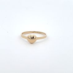 14k solid gold baby ring, ring size 4 stamped 14k gold.  Keepsake gift or midi, or pinky ring.  Model is 9 and wearing on her middle finger.  Puff heart design ring Celebrate with and wear to or gift for the following occasions or styles   :Baptisim :Christmas :Dedication :Birthday :Bridal Party :Midi :First knuckle :Above knuckle  :Daughters first ring Classic 14k Gold Heart Ring For Everyday, Hypoallergenic Yellow Gold Ring For Promise, Hypoallergenic Yellow Gold Promise Ring, Everyday Yellow Gold Heart Ring, Gold Heart Ring For Valentine's Day With Round Band, Stamped 14k Yellow Gold Rings For Valentine's Day, Stackable Yellow Gold Heart Ring As Gift, Classic 14k Gold Heart Ring As Gift, Heart Shaped 14k Gold Rings