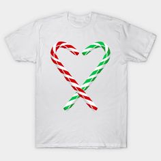 a white t - shirt with two candy canes in the shape of a heart