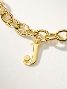 You’ll be unforgettable in this gold initial bracelet. Crafted from a gold chain bracelet and an initial pendant, our Remember Me Bracelet deserves a spot in your jewelry collection. For a fully personalized look, shop our Initial Jewelry Collection. | Gold Initial Remember Me Chain Bracelet with Letter E | Women's Jewelry by Uncommon James Be Unforgettable, Initial Bracelet Gold, Uncommon James, Gold Chain Bracelet, Remember Me, Initial Bracelet, Gold Initial, Initial Jewelry, Gold Bracelet Chain