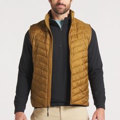 For those cool mornings out in the blind, our Mallard Quilted Performance Vest layers perfectly with any of our long sleeve performance tees for a warm, comfortable fit. This vest features roomy front pockets to keep your hands warm and is machine washable for easy care. 100% Nylon YKK Zipper Closure Machine Washable Casual Midweight Vest For Outdoor, Casual Midweight Vest For Outdoor Activities, Outdoor Fall Tops With Side Pockets, Fall Tops With Side Pockets, Functional Outdoor Tops With Side Pockets, Functional Fall Tops, Functional Midweight Tops For Fall, Winter Nylon Top For Outdoor, Versatile Fall Outdoor Tops