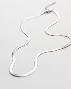 White Snake Chain Necklace With Silver Chain, Silver Stainless Steel Snake Chain Necklace, Silver Snake Chain Necklace With Lobster Clasp, Silver Snake Chain Necklace With Delicate Chain For Everyday, Everyday Silver Snake Chain Necklace With Adjustable Chain, Silver Metal Snake Chain Necklace, White Sterling Silver Snake Chain Necklace, Silver Snake Chain Necklace With Adjustable Chain, Delicate Stainless Steel Snake Chain Necklace