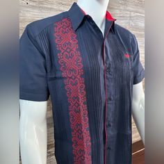 Beautiful Elegant Handcrafted Guayabera Shirt Navy Blue With Red Embroidery Made In Merida Yucatan Mexico 100% Fine Linen Short Sleeve Ref Double Cross Stitch Embroidery - Bordado Doble Punto De Cruz High Quality Product 100 % New Product. New Inventory 2024 Good For Formal Or Casual Wear. Even For An Special Event Like Wedding Or Birthday. Makes A Great Gift For Someone Please See Sizing Chart For Proper Fitment. Thank You And God Bless You. Traditional Fitted Blue Shirt, Elegant Short Sleeve Embroidered Shirt, Elegant Embroidered Short Sleeve Shirt, Traditional Blue Fitted Shirt, Traditional Red Fitted Shirt, Fitted Traditional Red Shirt, Red Fitted Traditional Shirt, Traditional Embroidered Shirt For Formal Occasions, Red Short Sleeve Top With Resham Embroidery