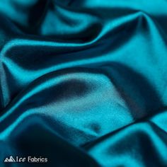 Description Complete your creative projects with our Shiny Stretch Charmeuse Satin Fabric, an exquisite material that combines the luxurious feel of silk with the practicality and versatility of modern fabrics. New Shiny Teal Blue Charmeuse Stretch Satin Fabric by the yard This high-quality imitation silk fabric, measuring 60 inches wide, is perfect for an array of applications, from glamorous dresses to cozy blankets and eye-catching decorations. Crafted with an optimal blend of 98 % polyester and 2% stretch, our fabric offers an unparalleled mix of softness, durability, and elasticity. The high nylon composition results in a smooth, lustrous surface that radiates sophistication and elegance. Meanwhile, the inclusion of spandex provides an incredible 4-way stretch, ensuring the fabric can Fabric Folds, Stretch Satin Fabric, Modern Fabrics, Glamorous Dresses, Faux Fur Fabric, Organza Fabric, Fur Fabrics, Dotted Fabric, Sequin Fabric