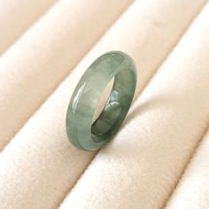 Ring Size:14.4MM(3 1/4US) Width:5MM Thickness: 3MM Weight:1.81g Packing:Gift Box ( Certificate included ) My shop, all the products come from different mining areas in Burma. Naturally formed jewel-grade jadeite, they are very beautiful. All products in our shop are natural jade, beads will have fine stone lines, which is normal.Support global testing products The color of the jade jade in Myanmar is different because of the customs of the region, and the subdivision method is slightly different. In the jade kingdom of Myanmar, the jade is divided into three categories and 12 grades. According to its emerald color, it is subdivided into more than 30 kinds of grades. In general, the color of Burmese jade can be roughly divided into the following six kinds: 1. White. Basically free of other Jadeite Ring, Packing Gift, Blue Ice, Emerald Color, Gem Ring, Jade Ring, Natural Jade, Jade Beads, Stackable Rings