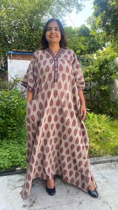 "Buttoned neckline with pocket/ 100 percent Cotton dress ideal as summer dress, lounge , nightwear and sleepwear  The beauty of this dress is- - Truly Handmade - Authentic, Exclusive dress- Soft colour with beautiful Indian motif. -100 percent soft cotton- -Collared  buttoned neckline . - One Big pocket for keys, mobile, handkerchief etc. -Side leg slits for extra leg comfort  - One size fits up to US10-24  -  Looking for short or longer version or fitted kaftan? We Customise it for free at your own choice if height / size , please message it to the seller while checking out. - Please 🙏 have a look at our verified feedback's and pictures by my Happy Buyers - the Truth in our handmade shop since 8 years- only on Etsy For reference- Model ( me) height 5'5\" and US 14-16 size . -For more opt Brown Free Size Traditional Dress, Brown Tunic Dress In Free Size, Brown Tunic Dress One Size, Brown Free Size Tunic Dress, Summer Caftan, Indian Motif, Custom Robes, Plus Size Robes, Cotton Caftan