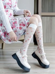 These socks feature colorful floral print decorations, simple, elegant, and versatile, with a strong sense of design.Add a touch of whimsical charm to your wardrobe with these beautifully designed socks. Adorned with colorful floral print decorations, they bring a burst of vibrant elegance to any outfit. Their simplicity and elegance make them incredibly versatile, perfect for pairing with both casual and dressier ensembles. Crafted with a keen eye for design, these socks are not just an accesso Cute Knee-high Socks For Spring, White Casual Knee-high Socks For Spring, Casual White Knee-high Socks For Spring, Casual Floral Print Socks For Spring, Cute Cream Socks For Spring, Cute Knee-high Spring Socks, White Socks For Spring, Cute Cream Spring Socks, Trendy Knee-high Spring Socks