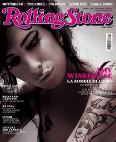 the cover of rolling stone magazine showing a woman with tattoos on her arm and shoulder