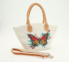 Embellished with a stylish top handle, this sweet (and stylish!) summer tote will leave you fielding compliments all season long. From America & Beyond. Summer Shoulder Bag With Detachable Handle For Shopping, Spring Vacation Canvas Shoulder Bag, Chic Spring Top Handle Beach Bag, Chic Top Handle Beach Bag For Spring, Chic Summer Beach Bag With Top Carry Handle, Chic Spring Beach Bag With Top Handle, Summer Shopping Bags With Top Carry Handle, Bohemian Bags For Spring Shopping, Canvas Shoulder Bag For Spring Shopping