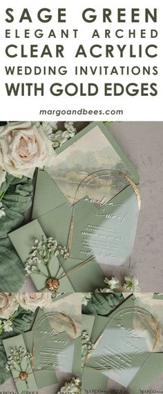 the wedding stationery with gold edges is displayed on top of green envelopes and white flowers