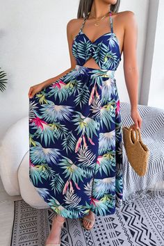 Feel beautiful and tropical in our floral print halter cutout dress! From the aloha vibes to the summer-inspired style, you'll feel like you're on vacation with every wear. The tropical print evokes the spirit of vacation living. Make summer last with this stunning dress! Material: 95% polyester, 5% spandex Stretch: Slightly stretchy Sheer: No Body: Not lined Care instructions: Machine wash cold. Tumble dry low. Imported Shipping estimate: 7-14 days Size Guide S: length 45 in, bust 34 in, waist Casual Dress Patterns, Style Bleu, Costume Intero, Outfit Look, Botanical Print, Printed Ties, Cutout Dress, Style Chic, Tropical Print