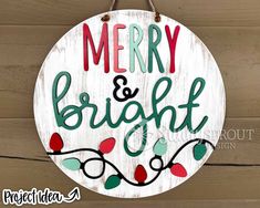 merry and bright sign hanging on a wooden wall